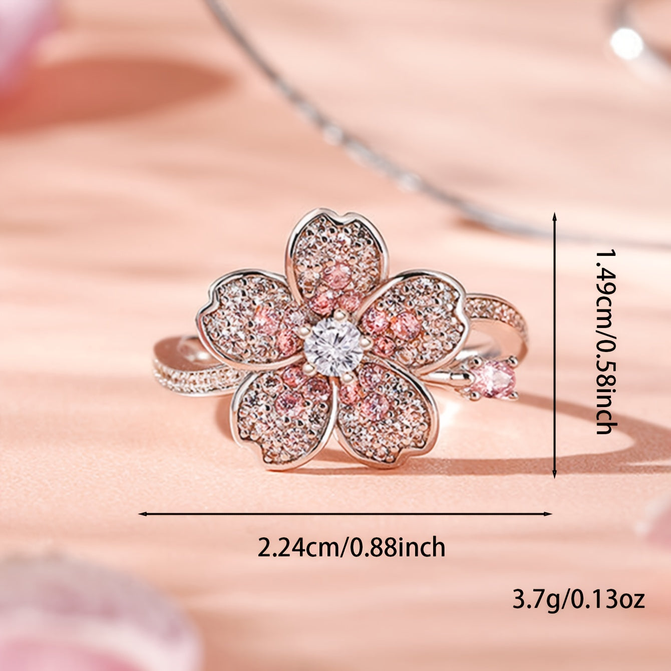 A ring of white Zirconia flowers and pink Zirconia rings. A lady's engagement ring for her Valentine's Day gift.