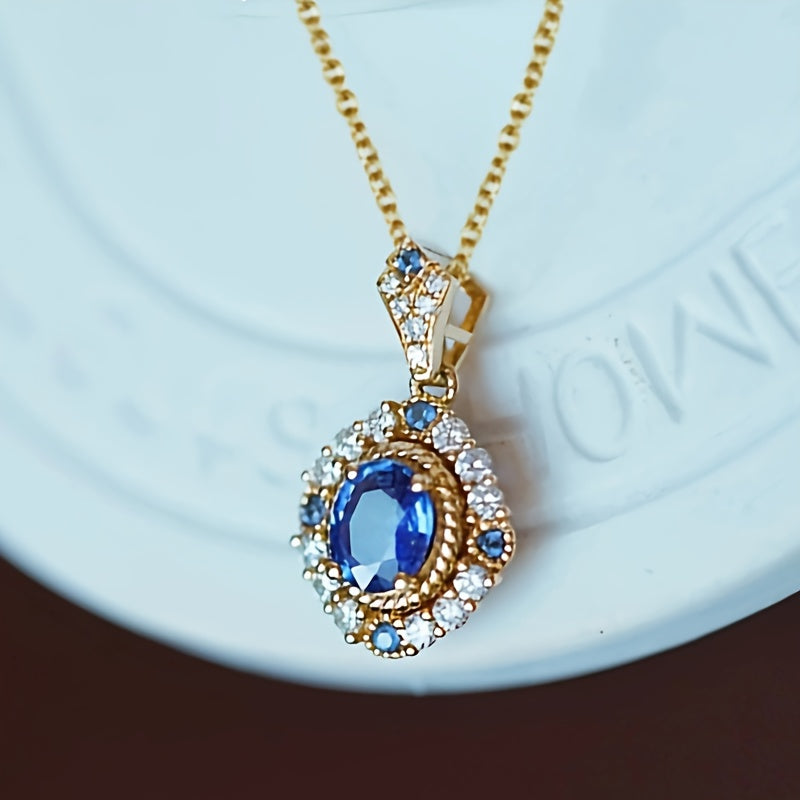 Elegant vintage style engagement and wedding necklace with oval blue synthetic gemstone - the perfect anniversary gift for her