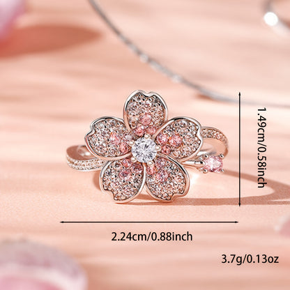 A ring of white Zirconia flowers and pink Zirconia rings. A lady's engagement ring for her Valentine's Day gift.