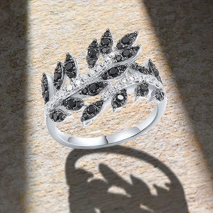 Retro-style black synthetic gemstone ring with floral and leaf patterns - perfect for Casual Attire, parties and gifts