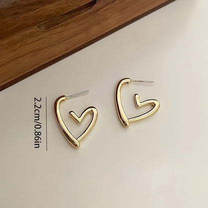 A pair of hollow heart stud earrings, hypoallergenic 925 silver needle, high quality 304 stainless steel, casual theme, perfect holiday gift