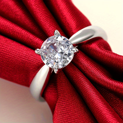 An elegant and minimalist round cut synthetic Zirconia engagement ring, four-claw inlay, copper, April birthstone, anniversary gift, Valentine's Day jewelry, suitable for all seasons
