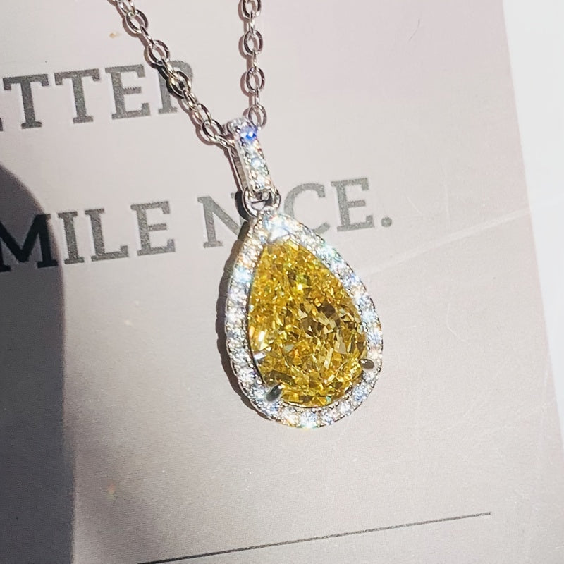 Elegant and luxurious yellow synthetic gemstone teardrop pendant necklace - perfect for engagements, weddings, anniversaries and everyday glamour