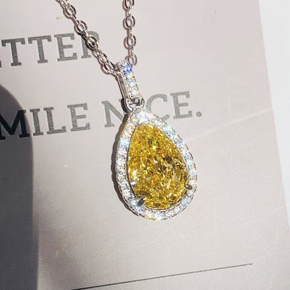Elegant and luxurious yellow synthetic gemstone teardrop pendant necklace - perfect for engagements, weddings, anniversaries and everyday glamour