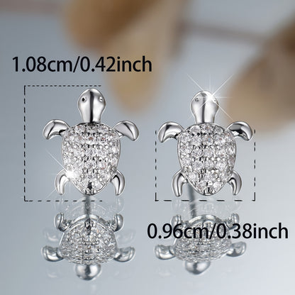 A cute pair of women's turtle earrings - elegant bohemian with shiny square zircon and copper - perfect for weddings, parties and beachfront attire