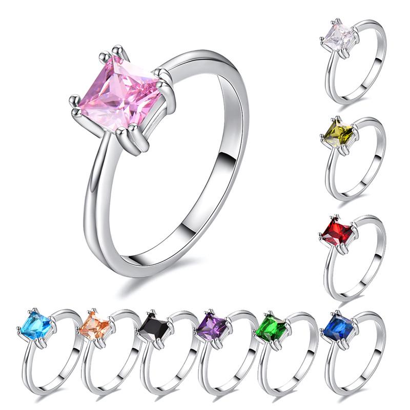 Jewelry gifts showcase square rings in different colors, such as white, blue, pink, and green, designed for Women's fashion and wedding rings.