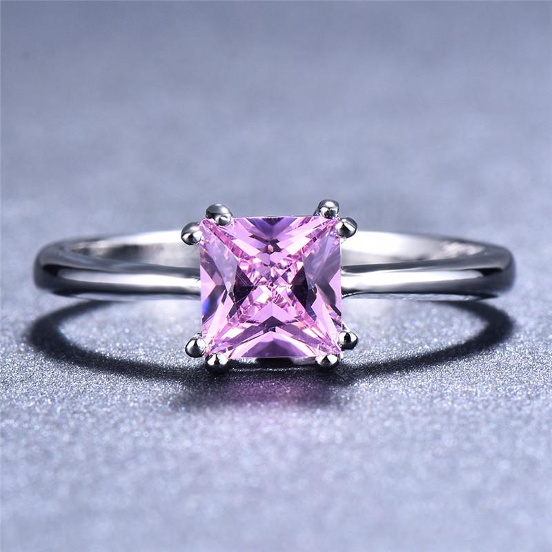 Jewelry gifts showcase square rings in different colors, such as white, blue, pink, and green, designed for Women's fashion and wedding rings.