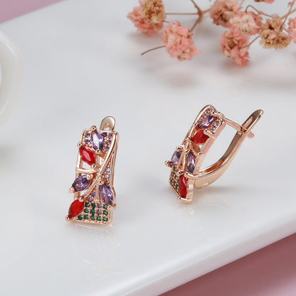 A pair of luxurious gold flower pendant earrings, colorful ornate earrings, fashionable bridal wedding jewelry