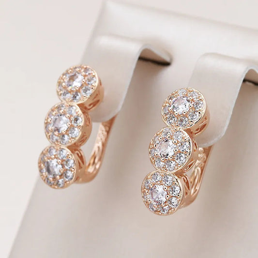 Elegant gold-toned sparkling Zirconia pendant earrings - perfect for weddings and everyday glamour, winter and New Year's wear