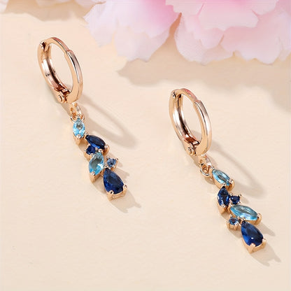 A pair of Women's gold pendant earrings, luxury bluestone leaf drop earrings, wedding jewelry, for pretend play