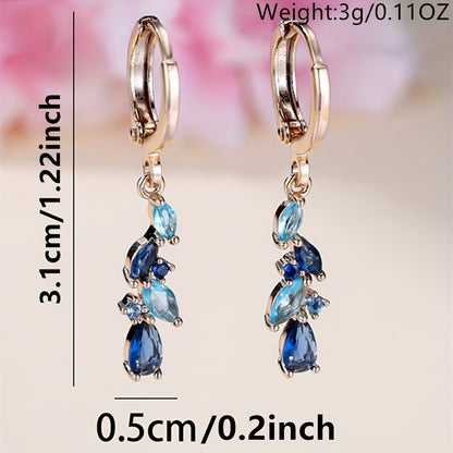 A pair of Women's gold pendant earrings, luxury bluestone leaf drop earrings, wedding jewelry, for pretend play