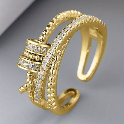 An Adjustable Rotary Anxiety Ring - French Holiday Style Declaration Ring with Cubic Zirconia - Copper Spiral Cross Design - Unisex Carnival Holiday Jewelry for Everyday and Party Occasions - April Birthstone Jewelry - Synthetic Gemstones