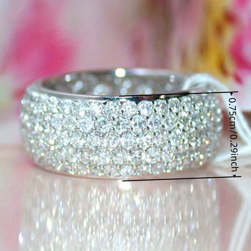 Graceful and luxurious eternal ring for ladies: A flawless present for all occasions - adorned with artificial diamonds and copper blend