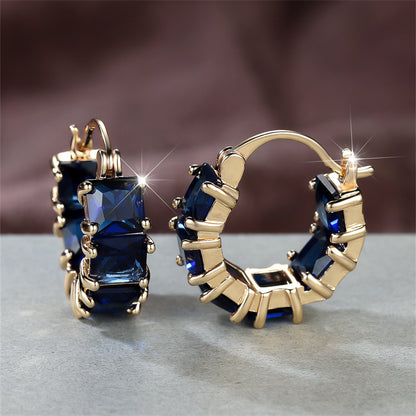 Elegant gold-toned square-cut blue Zirconia pendant earrings - the perfect gift for Valentine's Day, Halloween and Christmas, for winter and New Year's wear