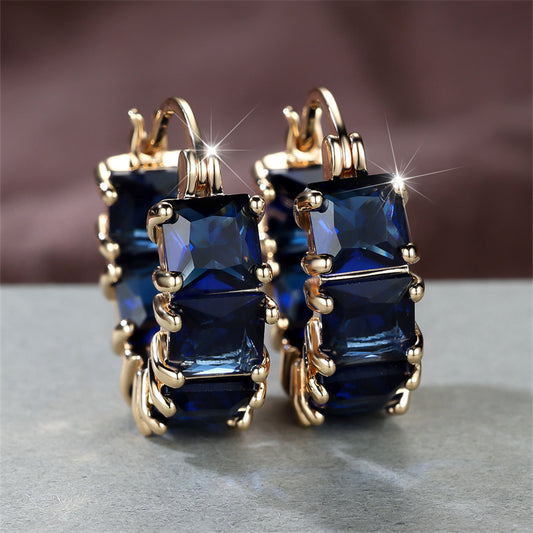 Elegant gold-toned square-cut blue Zirconia pendant earrings - the perfect gift for Valentine's Day, Halloween and Christmas, for winter and New Year's wear