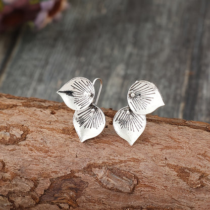 Retro minimalist style silver alloy petal drop earrings, stylish minimalist design, elegant jewelry accessories