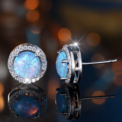 A pair of elegant white and blue opal round earrings with cubic zirconia halo - perfect for weddings, parties and Valentine's Day gifts, party accessories | occasions | zirconia decoration
