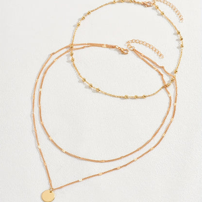 Vintage Gold Layered Bead Chain Necklace with Round Pendant for Ladies - Perfect for Everyday Wear and Parties