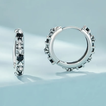 A pair of elegant Women's round earrings with black cubic Zirconia gemstones, simple and lovely style, silver round earrings for parties, banquets and everyday casual accessories