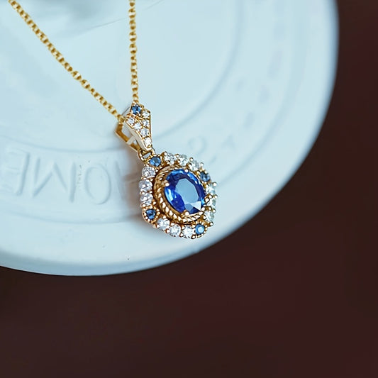 Elegant vintage style engagement and wedding necklace with oval blue synthetic gemstone - the perfect anniversary gift for her