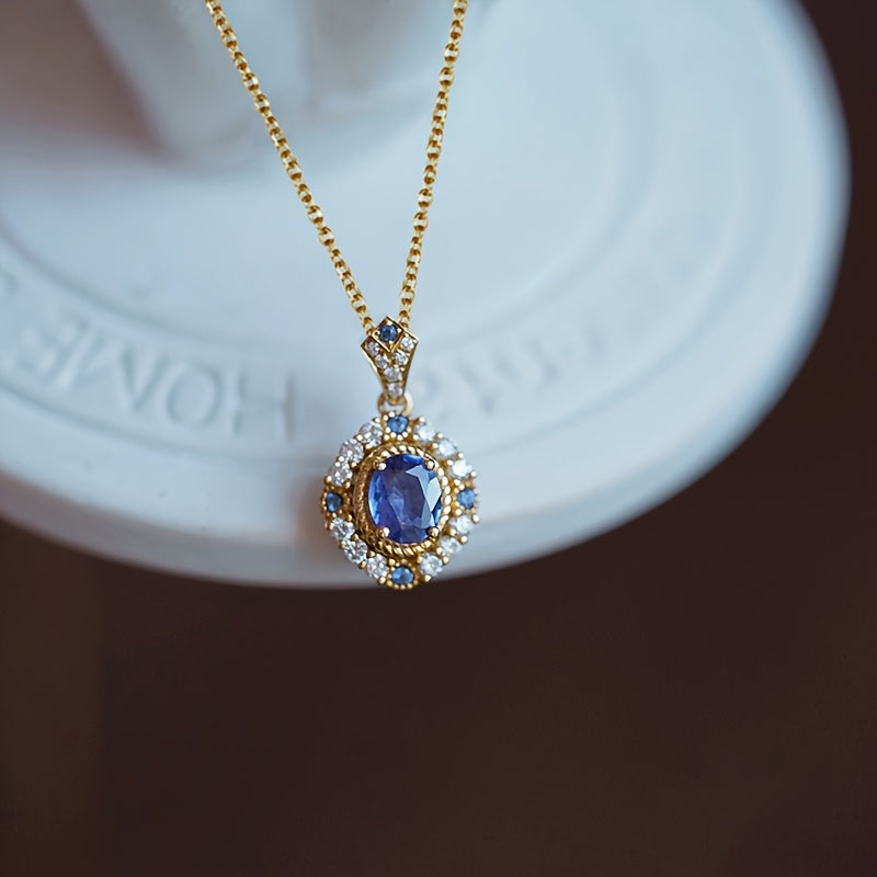 Elegant vintage style engagement and wedding necklace with oval blue synthetic gemstone - the perfect anniversary gift for her