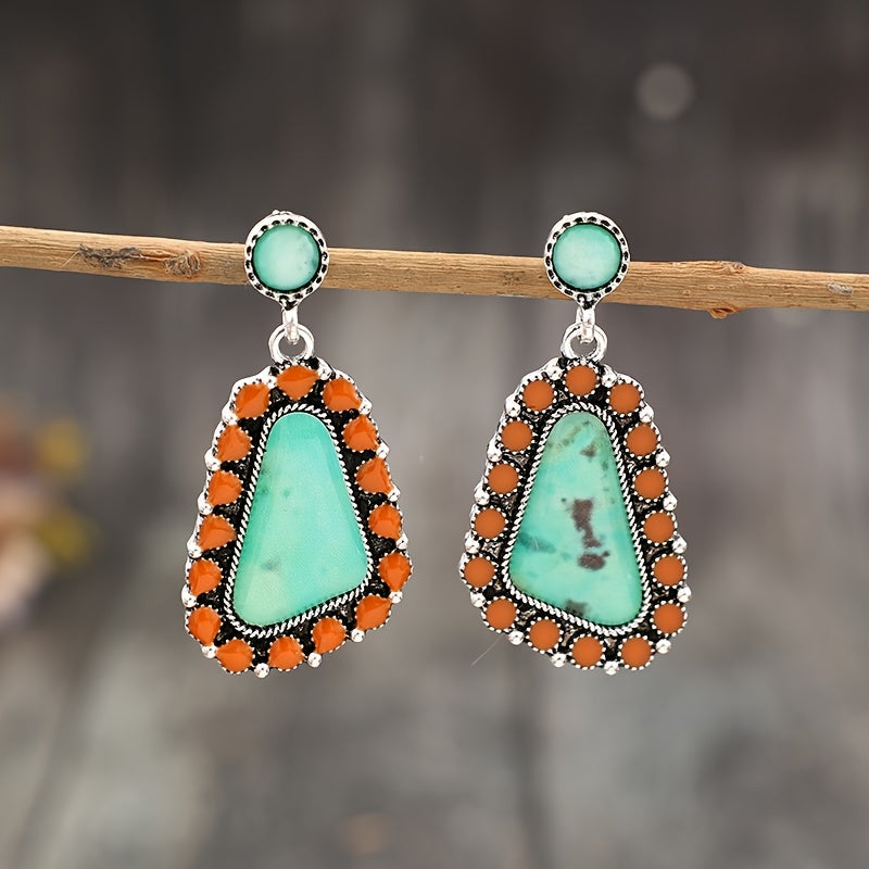A pair of Bohemian geometric resin stickers with ethnic stylish alloy earrings.
