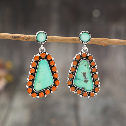 A pair of Bohemian geometric resin stickers with ethnic stylish alloy earrings.