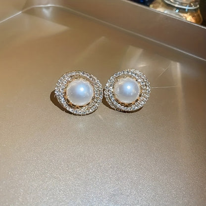 Delicate round stud earrings with imitation pearls for an elegant retro style, suitable for women dating and weddings