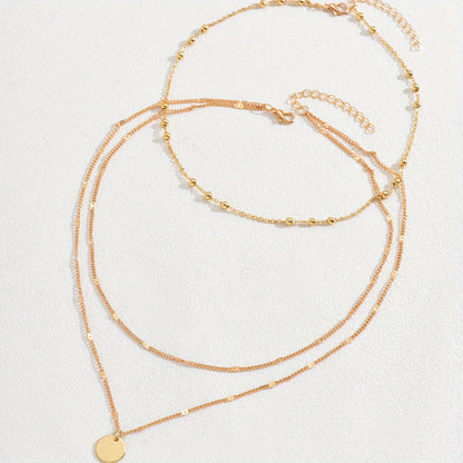 Vintage Gold Layered Bead Chain Necklace with Round Pendant for Ladies - Perfect for Everyday Wear and Parties