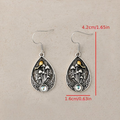 A pair of retro moonstone teardrop mushroom stud earrings, fashionable alloy drip earrings, with artificial analog gemstones and iron ear needles, suitable for women, suitable for over 15 years old