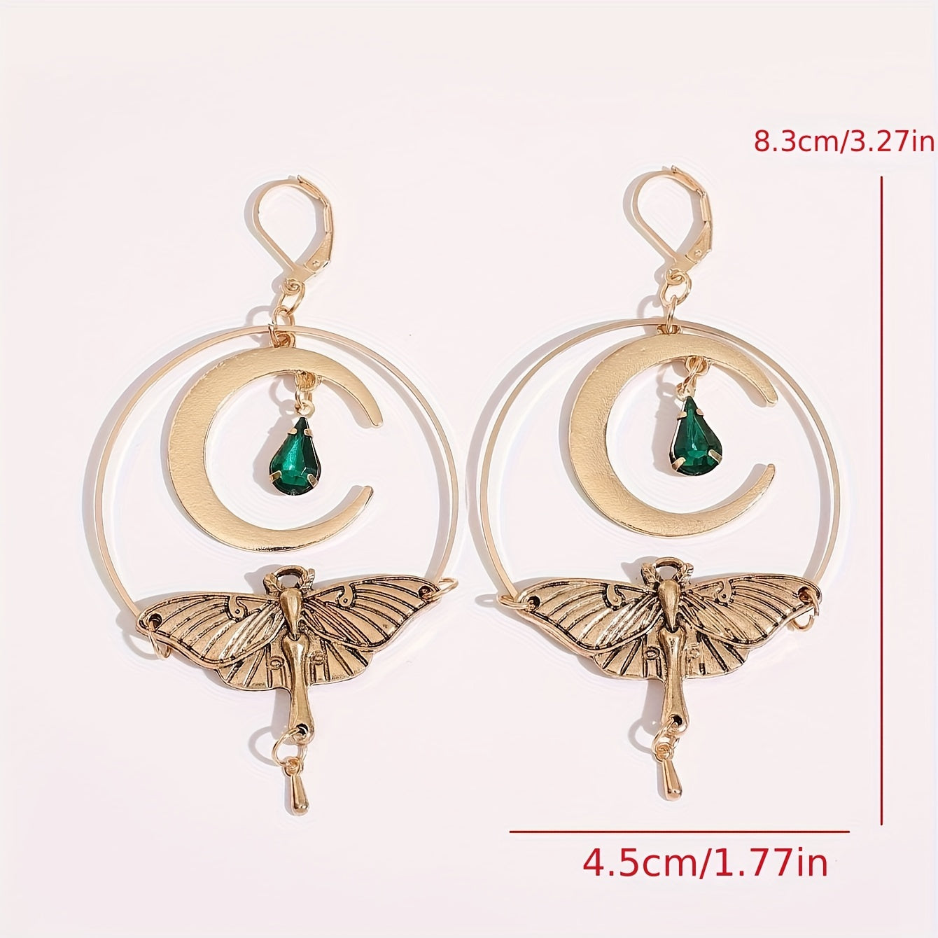 A pair of vintage crescent stud earrings with a green resin moth pendant, zinc alloy, and iron pillars for everyday wear jewelry in all seasons