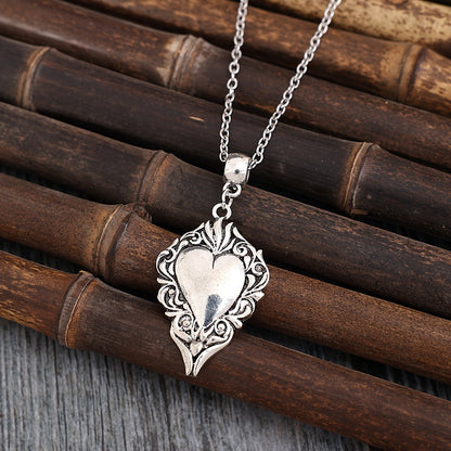 New Cross-Border Bohemian Vintage Hollow Edge Love Alloy Pendant Necklace