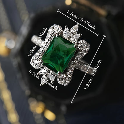 A stylish and luxurious palace-style ring with a four-claw setting and green synthetic gemstone is suitable for Women's engagements, weddings, daily casual wear, anniversary gifts, and does not come with a box.