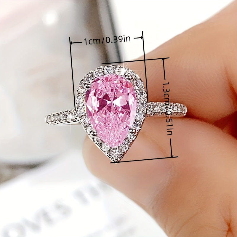 Elegant Women's drop-shaped Zirconia engagement ring with 3-claw inlay and copper synthetic stone, perfect for marriage proposals and bridal jewelry