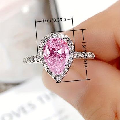 Elegant Women's drop-shaped Zirconia engagement ring with 3-claw inlay and copper synthetic stone, perfect for marriage proposals and bridal jewelry