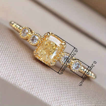 Ladies engagement wedding banquet jewelry, beautifully set yellow faux gemstone ring, four-claw design