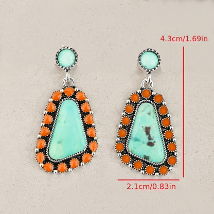 A pair of Bohemian geometric resin stickers with ethnic stylish alloy earrings.