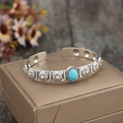 A vintage bohemian turquoise inlaid bracelet, alloy open bracelet, engraved floral design, fashion jewelry accessories
