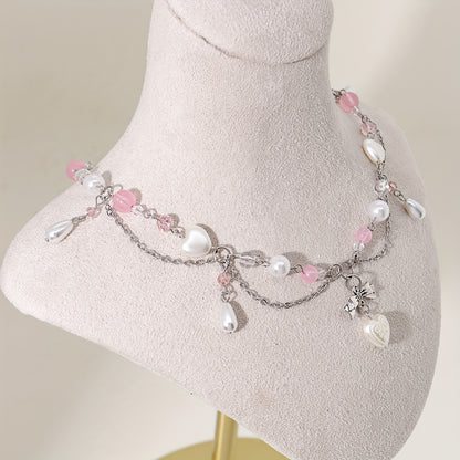 An elegant Y2K-style necklace with a butterfly bow and heart-shaped pendant, imitation pearl tassels, and cute fashion accessories for parties, birthdays, and holidays