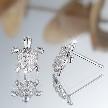 A cute pair of women's turtle earrings - elegant bohemian with shiny square zircon and copper - perfect for weddings, parties and beachfront attire