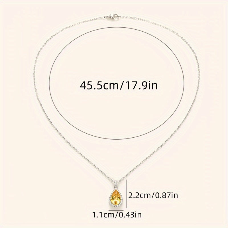 Elegant and luxurious yellow synthetic gemstone teardrop pendant necklace - perfect for engagements, weddings, anniversaries and everyday glamour