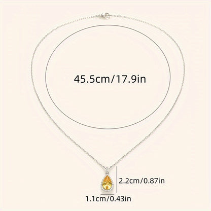 Elegant and luxurious yellow synthetic gemstone teardrop pendant necklace - perfect for engagements, weddings, anniversaries and everyday glamour