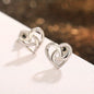 Hollow silver heart-shaped buckle stud earrings, cute and simple style, copper and silver plated jewelry, suitable for daily casual wear