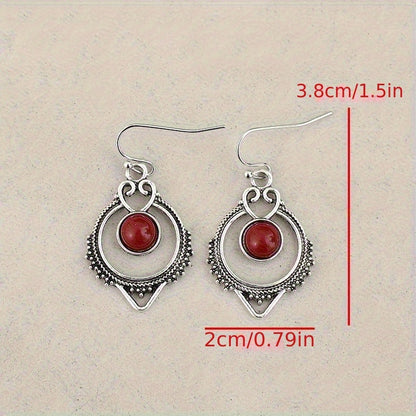 Retro-style silver synthetic gemstone stud earrings, zinc alloy iron earrings, elegant hollow design, suitable for daily wear
