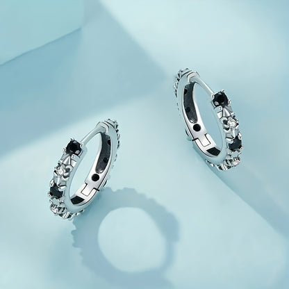 A pair of elegant Women's round earrings with black cubic Zirconia gemstones, simple and lovely style, silver round earrings for parties, banquets and everyday casual accessories