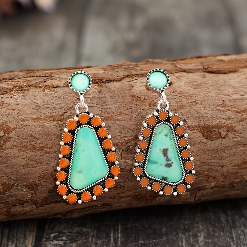 A pair of Bohemian geometric resin stickers with ethnic stylish alloy earrings.