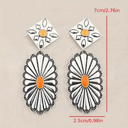 A pair of bohemian vintage floral engraved earrings, alloy pendant with iron studs, bohemian fashion earrings, silver tones with orange accents