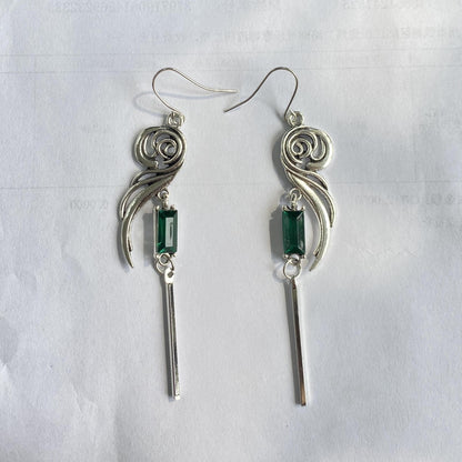 Silver stud earrings, blue-green square artificial diamonds, hollow metal design, zinc alloy, copper ear needles, glass setting, nickel ion, daily wear