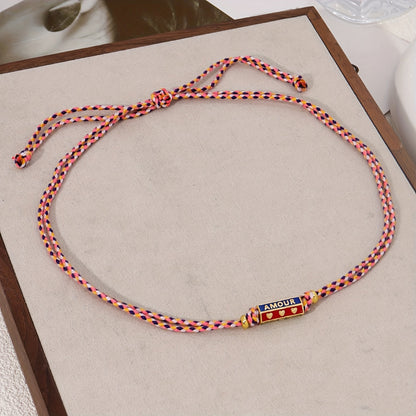 A tribal style handwoven rope pendant necklace for women with copper metal letter pendant - stylish vacation party jewelry accessories, unplated - daily and party wear, suitable for all seasons (1 piece)