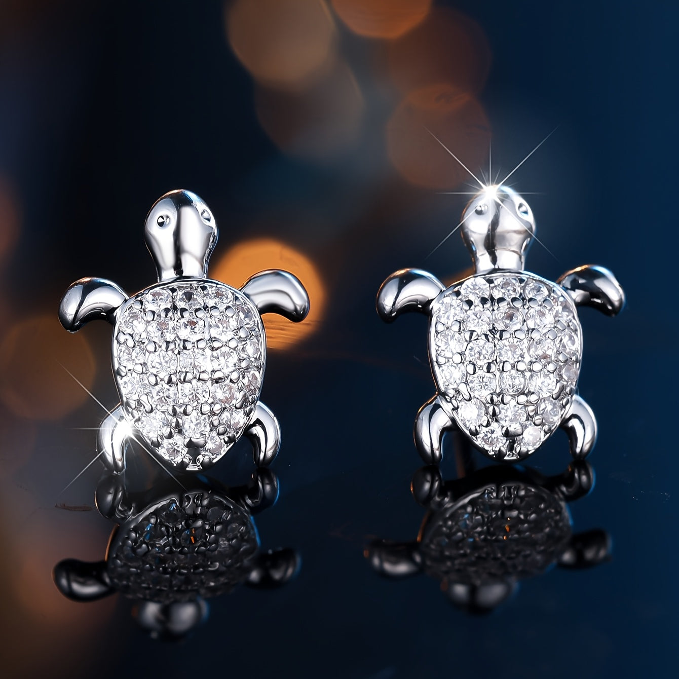 A cute pair of women's turtle earrings - elegant bohemian with shiny square zircon and copper - perfect for weddings, parties and beachfront attire